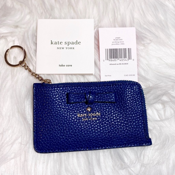 kate spade Handbags - Lowest price! Kate Spade BLUE BOW card holder 😍